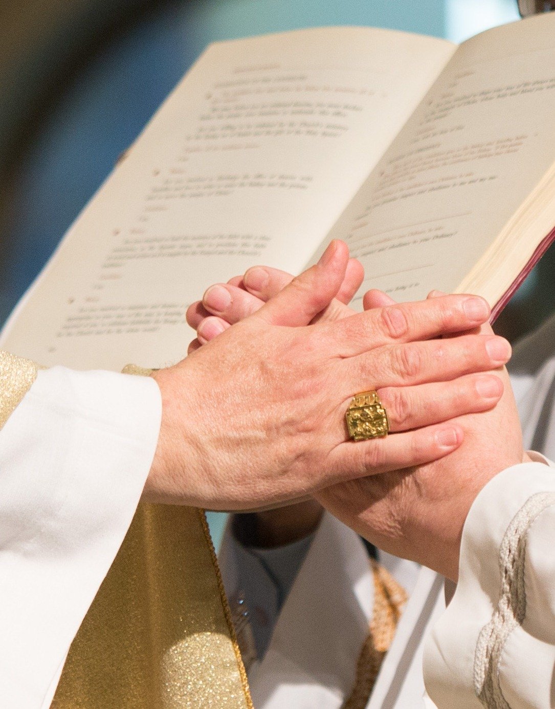 Picture shows candidate placing his hands in the hands of the Bishop pledging his obedience to the Archbishop and his successors